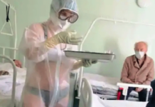 ਗਰਮੀਂ ਹੋਣ ਕਰਕੇ ਪੀਪੀਈ ਕਿੱਟ ਦੇ ਅੰਦਰ ਅੰਡਰਗਾਰਮੈਂਟਸ ਪਾ ਕੇ ਮਰੀਜ਼ਾਂ ਦੀ ਦੇਖਭਾਲ ਕਰ ਰਹੀਂ ਰਸ਼ੀਅਨ ਨਰਸ