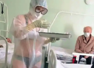 ਗਰਮੀਂ ਹੋਣ ਕਰਕੇ ਪੀਪੀਈ ਕਿੱਟ ਦੇ ਅੰਦਰ ਅੰਡਰਗਾਰਮੈਂਟਸ ਪਾ ਕੇ ਮਰੀਜ਼ਾਂ ਦੀ ਦੇਖਭਾਲ ਕਰ ਰਹੀਂ ਰਸ਼ੀਅਨ ਨਰਸ